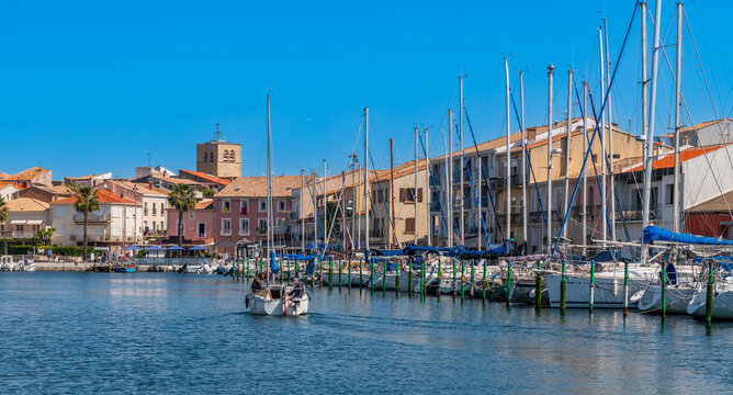 Boats and sailboats in the port of M&egrave;ze on the Thau Lagoon, in Occitanie, France