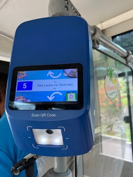 Mahe, Seychelles, Anse Royale, April 12, 2026. NFS validator on the bus to Takamaka Beach. Contactless payment terminal on the bus