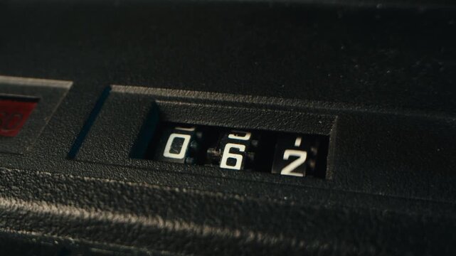 Retro radio tape recorder counter, audio cassette close-up. Listening to music, old radio boom box player, macro of vintage music listening. 