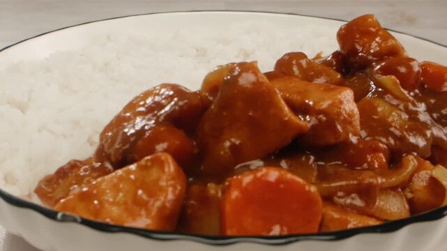 Japanese curry rice with fry pork Tonkatsu, Katsu Kare, Japanese breaded cooking dinner in restaurant, close up macro of asian food. 