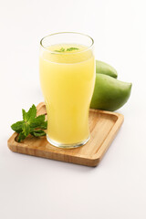 Fototapeta premium Aam Panha cooling juice made mostly during summer in India, garnished with mint leaves... 