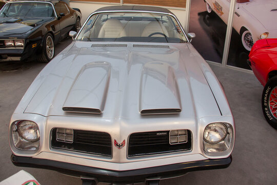 Tehran, Iran - February 18, 2017 - front view of 1976 pontiac firebird trans am silver color