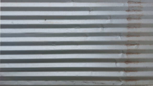 lang="x-default" Corrugated iron sheet metal background forming a construction fence