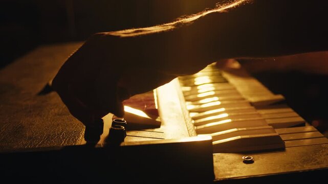 Playing piano vintage retro synthesizer. Close up of man hands playing jazz on the piano. Fingers on the piano, vintage colors. A very close look at a jazz pianist hands. Man playing the piano, close