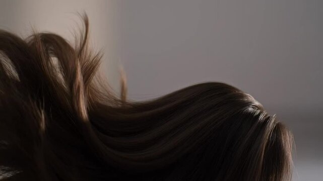 Woman with long brown hair movement.