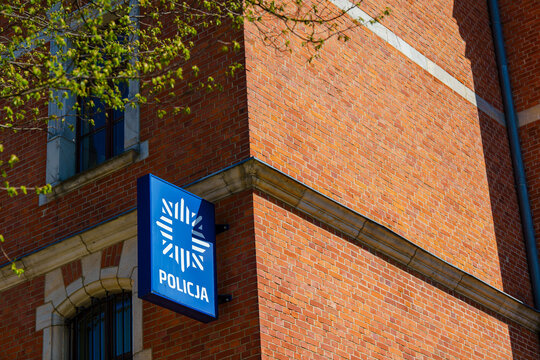 Polish Police Policja sign on red brick station building Nowa Ruda
