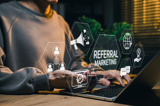 Referral marketing and customer advocacy growth concept. Person using laptop with network, sharing, communication, and reward icons. word of mouth promotion, audience reach, digital referral strategy