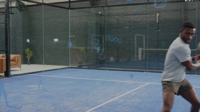 Ball volleying, two male players using paddles, practicing sports drills, showing blue metrics
