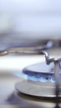 Putting coffee espresso maker on fire stove close-up