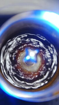 Making coffee in espresso maker top view slow motion