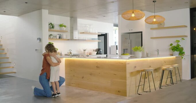 Diverse family mom entering kitchen with food child running and hugging, guiding to bench for meal