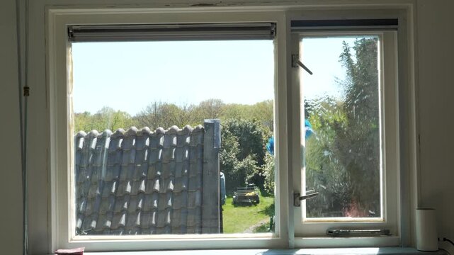 Professional high window cleaning with water-fed pole system