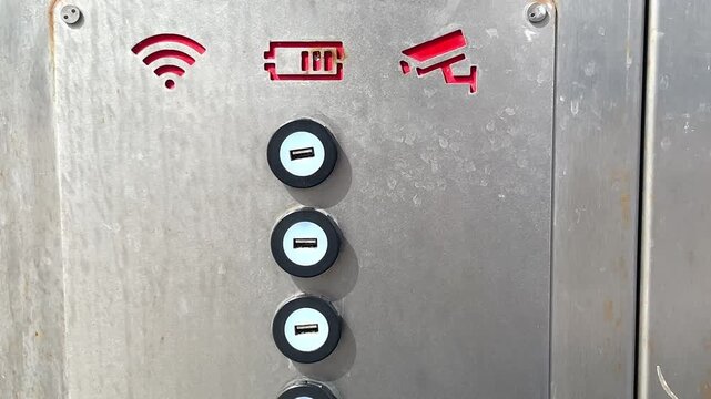 Charging station offers USB ports, Wi-Fi, and surveillance features in public area