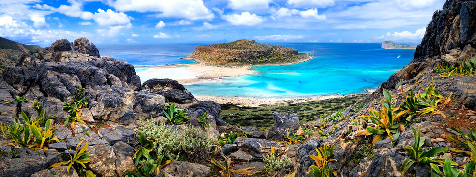 Balos Bay Crete Greece panorama of turquoise lagoon and Gramvousa island. Breathtaking Mediterranean sea landscape with rocky coast and exotic beach. Iconic Greek travel destination scenery