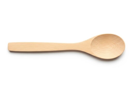 Light-colored wooden serving spoon on a plain background