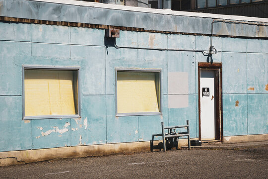 Urban alleyway with old worn building