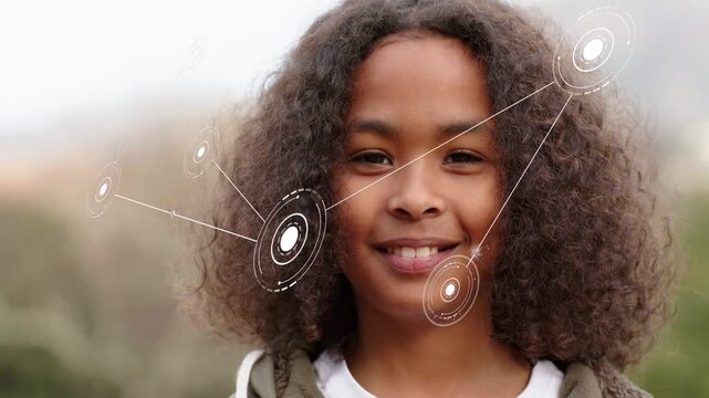 Vertical video: Boy standing ring forming tech nodes moving in linking smile widening mapping face