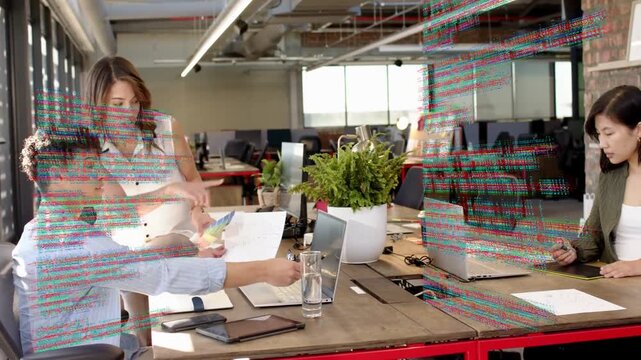 Lead handing docs starting business sync while team on laptops noting code glitch sweeping screens