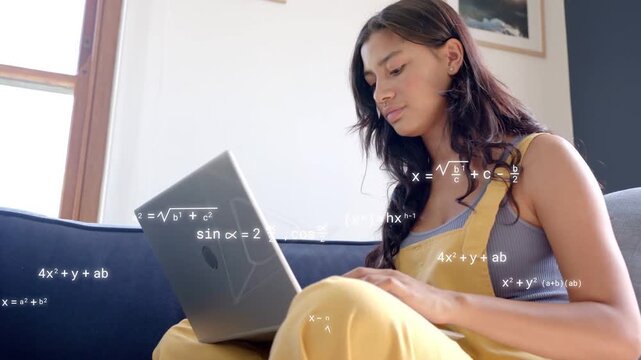 Student typing on laptop, causing math formulas and wireframes sweeping across torso for study