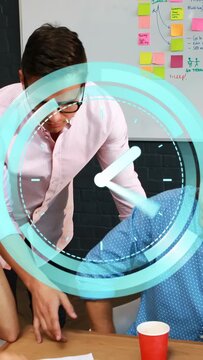 Vertical video: Man pointing at board, moving to table in business, animated clock showing schedule