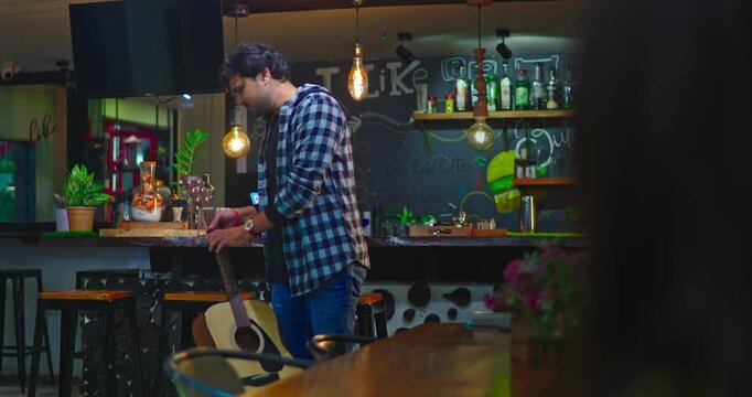 Emotional climax of a romantic drama where a musician chooses his present love, while his former lover breaks down and leaves, accepting the end of their story