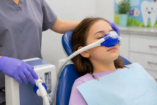 Pediatric Dental Sedation with Nitrous Oxide &ndash; Child Receiving Laughing Gas for Comfortable Dental Treatment