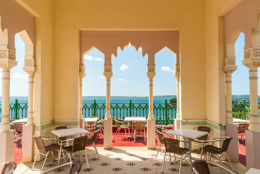 Cuba, Cienfuegos, Punta Gorda.  Rooftop dining area in the Arabic Palacio de Valle, a historic villa in built by the Italian architect, Alfredo Colli, in 1917. 