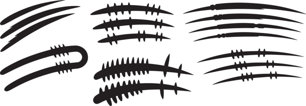 Collection of animal scratch marks, various shapes and sizes, claw trails, wild beast attack.