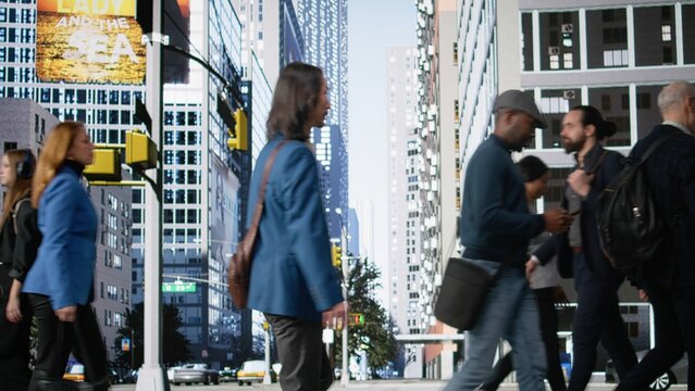 Multicultural crowd of pedestrians walking with steady motion through the cityscape showing urban crowd diversity, routine commute and the natural action of modern city life. Camera A.