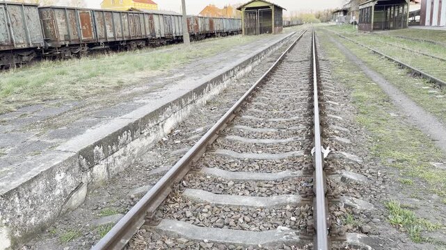 Empty train tracks at old station 4K