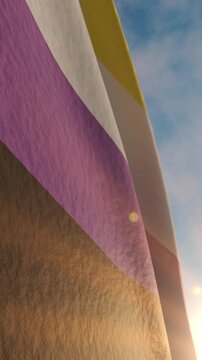 Pride month non binary flag waving at sunset