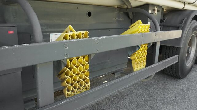 yellow wheel chock on tanker truck