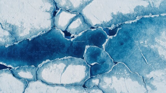 Cracked Arctic Ice with Deep Blue Water