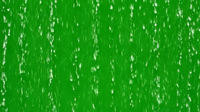 Abstract Green Background with Vertical White Streaks and Speckles.