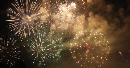 Fototapeta premium Golden Firework celebrate anniversary independence day night time celebrate national holiday. Countdown to new year 2023 party time event. Happy new year 2023, 4th of july holiday festival concept