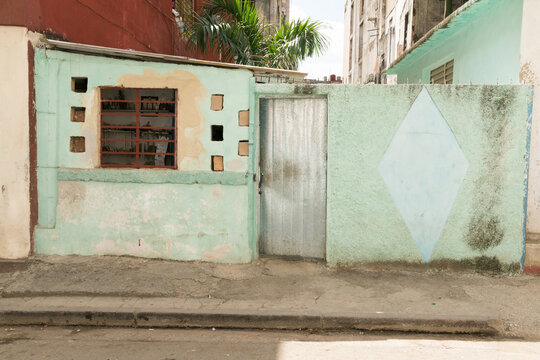 Cuba, Cienfuegos.  Oddly shaped green walls in old Havana