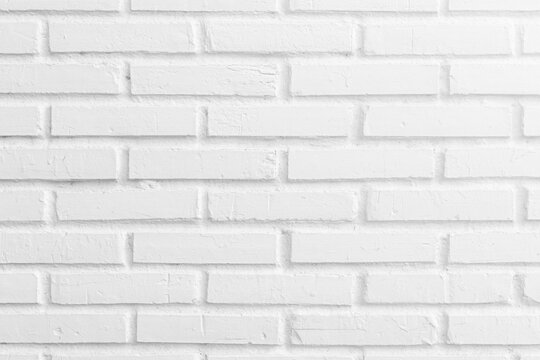 Modern white brick wall texture background for interior design and minimalist architectural backdrop with empty copy space