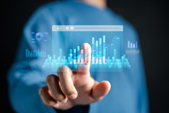 Person pointing at virtual dashboard with financial chart. Stock market trading and data analysis concept.