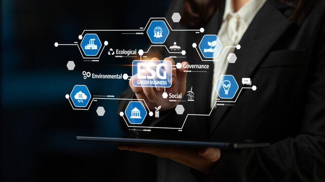 A business professional demonstrates ESG concepts focused on environmental, social, and governance themes, highlighting digital strategy and innovative solutions for sustainable growth. Tessel