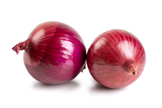 Two organic raw red onions with purple skin.  Culinary ingredient for healthy cooking and food on  white background.