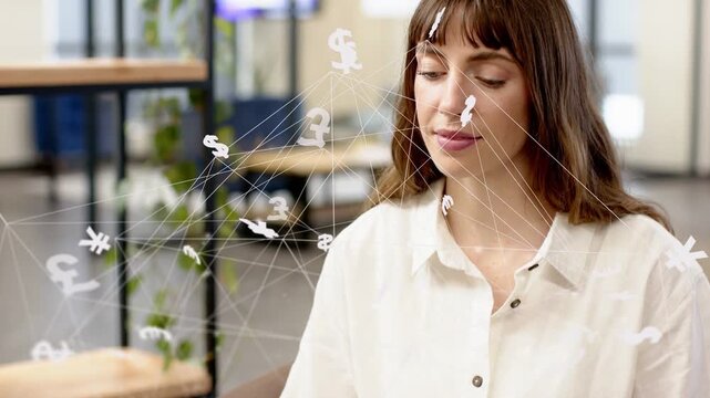 Woman focusing on laptop in lounge, causing currency network crossing face while analyzing markets