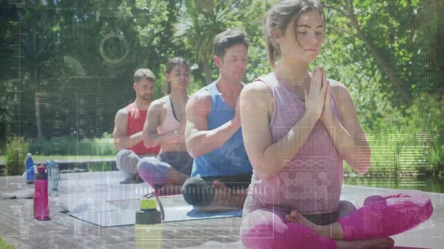 Front woman leading yoga group starting meditation on mats hands pressing chest breath icons rising