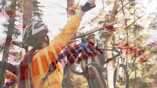 Woman lifting phone checking route on pine forest trail, red striped overlay marking cycling bikes