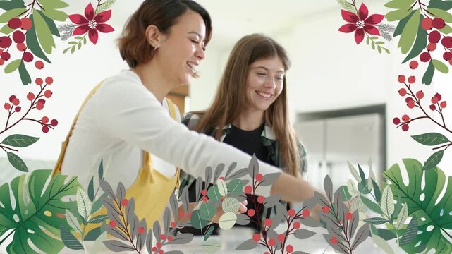 Two women pouring at kitchen counter, left woman tilting bottle causing floral frame prepping drink