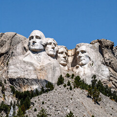 Obraz premium Papercraft Memorial Jefferson. The Black Hills Of South Dakota Serve As The Backdrop For A Digital Art Illustration Showcasing Mount Rushmore Memorial