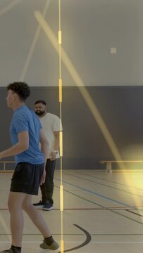 Vertical video: Blue player running to net, jumping for sports block, motion lines showing force
