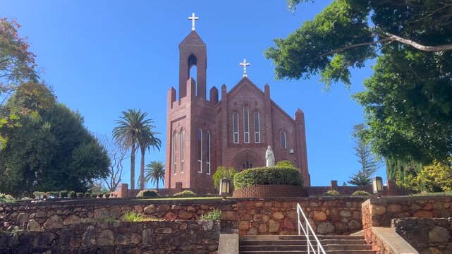 St Agnes' Catholic Parish in Port Macquarie, NSW. Established with its first church in 1878, the parish now serves over 13,000 members and provides extensive services ac