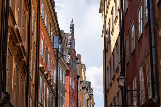 View of old buildings in Gamla Stan Stockholm, with light filtering in - horizontal