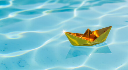 Golden Paper Origami Boat Floating on Crystal Clear Blue Rippled Water, Symbolizing Success and Wealth Concept