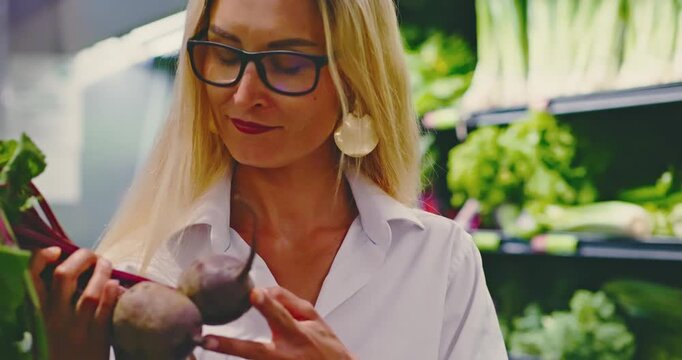Woman Shopping for Vegetables in a Grocery Store